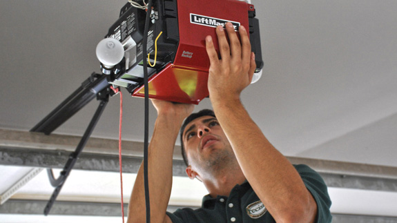 Technician Working on Lift Master