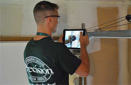 Precision tech performing balance test as part of safety inspection